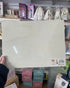 Back of Fun Factory wooden horse jigsaw puzzle board held in store — Adventure Awaits