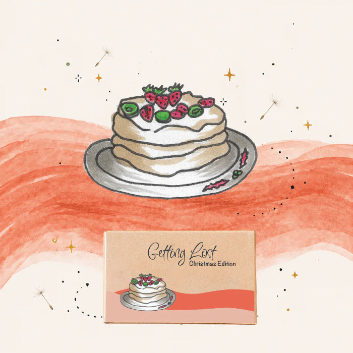 Getting Lost Christmas Edition card game with illustrated strawberry pancakes, Adventure Awaits