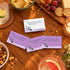 Getting Lost Lost The Plot Edition cards with conversation prompts arranged on a table with snacks and drinks — Adventure Awaits