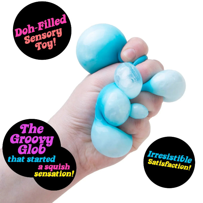 Blue NeeDoh GloBall dough-filled sensory squishy toy being squeezed in hand — Adventure Awaits