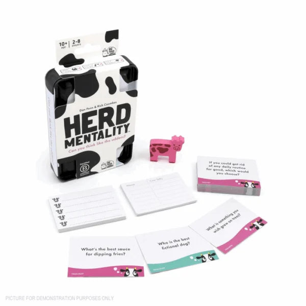 Herd Mentality party game with pink cow meeple, question cards and answer pads Adventure Awaits