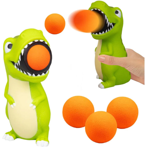 Green dinosaur popper toy with orange foam balls for kids active play — Adventure Awaits