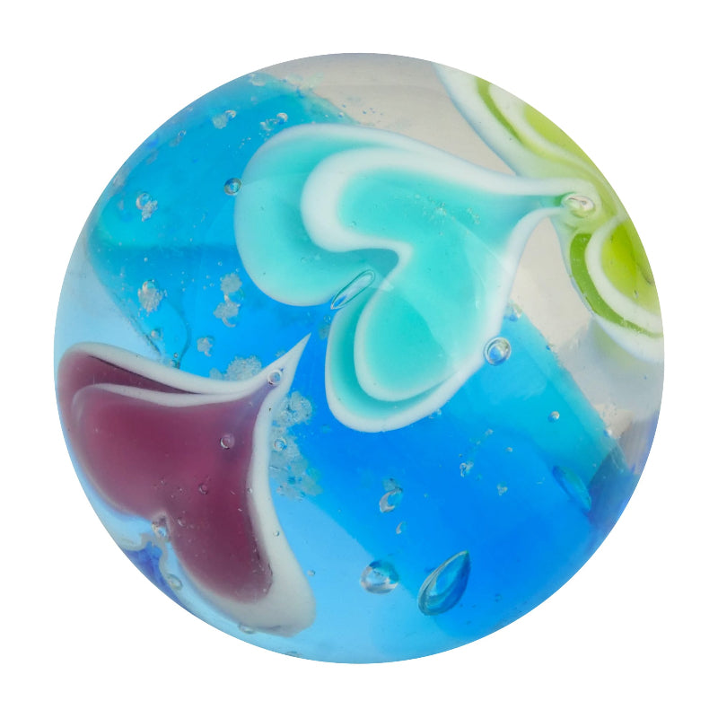 Clear blue glass marble with swirling aqua, purple and green patterns — Adventure Awaits
