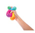 Hand squeezing colourful Crush It! super sensory ball for tactile play — Adventure Awaits