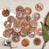 Australian wildlife memory game with round wooden animal pieces including koala, wombat, platypus and echidna — Adventure Awaits
