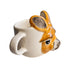 Ceramic mug with a kangaroo design on a blurred office background