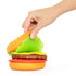 hand lifting top bun of peel and stack burger toy showing layered pieces inside, fun interactive stacking toy for imaginative play at home or travel Adventure Awaits