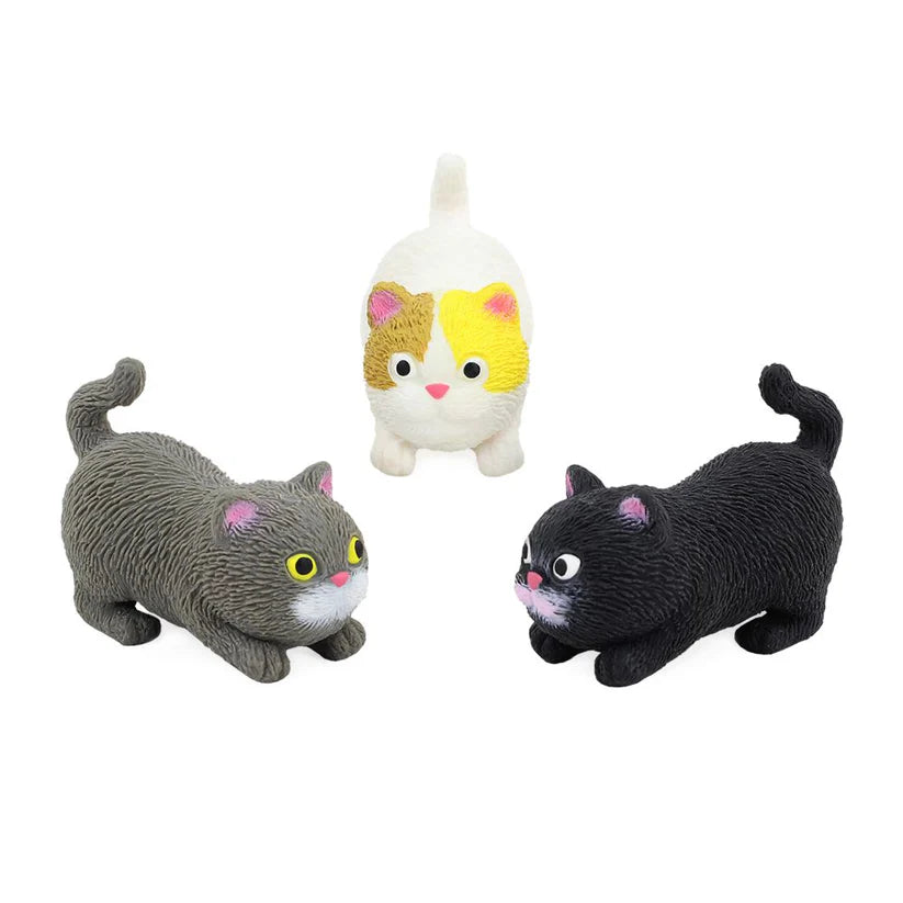 Three stretchy cat toys in grey, white and black designs — Adventure Awaits