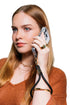 Woman takes a call with her phone secured by a black wrist strap with gold clasp, Adventure Awaits
