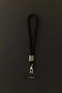 Black Klipsta phone wrist strap with gold clasp and phone connector tab, Adventure Awaits
