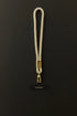 Light grey Klipsta phone wrist strap with gold clasp and phone connector tab, Adventure Awaits