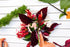 Child creating Koala Dream Bush Blooms nature weaving craft with leaves and flowers — Adventure Awaits