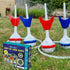 Buddy & Barney light-up lawn darts set up on grass with four darts, two targets and product box — Adventure Awaits
