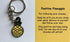 Positive Pineapple keyring with yellow comfort charm and support card close-up — Adventure Awaits