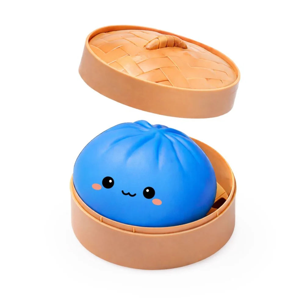 Blue lucky bao dumpling-shaped container with a smiling face squishy on a beige lid, on a white background