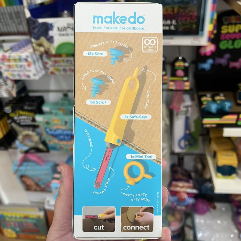 Makedo Build kit box lists 26 cardboard tools including Safe-Saw, Mini-Tool and reusable scrus — Adventure Awaits