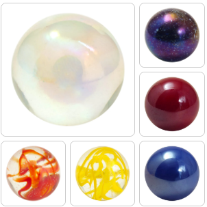 Assorted glass marbles in pearlescent, galaxy, red, orange, yellow and blue designs — Adventure Awaits