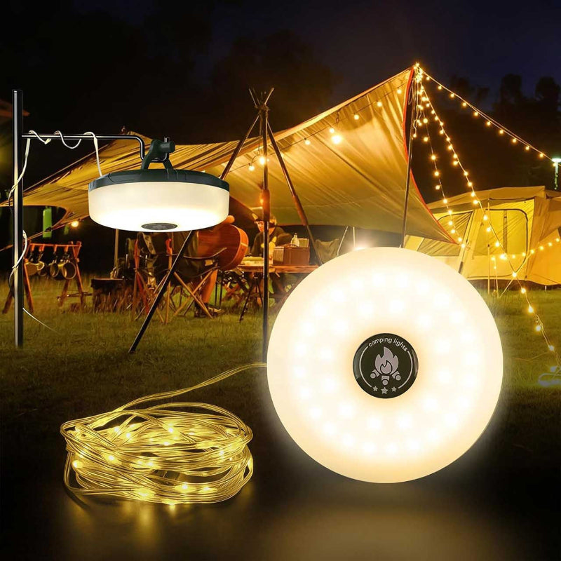 Camping scene with illuminated lights and a tent in the background