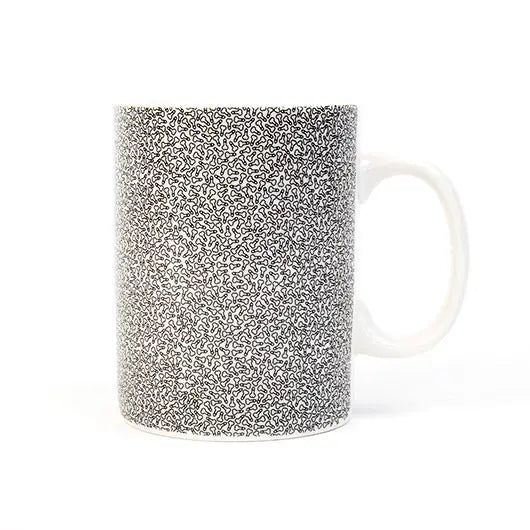White ceramic mug covered in a micro penis pattern — Adventure Awaits