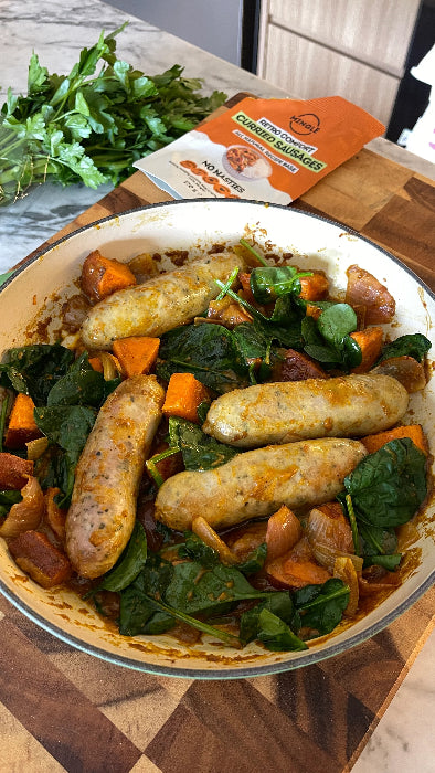 Alt text: Mingle Curried Sausages recipe base beside cooked sausages with sweet potato, spinach and onion — Adventure Awaits