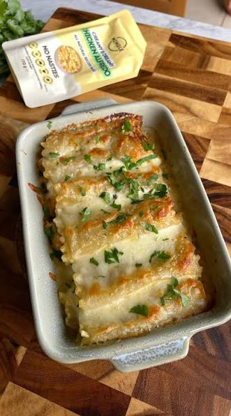 Mingle Chicken Alfredo recipe base beside a cheesy baked pasta dish topped with fresh herbs — Adventure Awaits