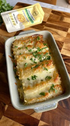 Mingle Chicken Alfredo recipe base beside a cheesy baked pasta dish topped with fresh herbs — Adventure Awaits