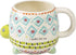 Turtle shaped ceramic mug with colourful geometric patterns and “I turtley love you” message