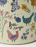 Close-up of Natural Life Free Range chicken mug with colourful hens, flowers and handwritten text — Adventure Awaits