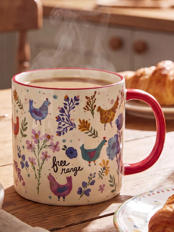 Natural Life Free Range chicken mug filled with a hot drink on a kitchen table — Adventure Awaits