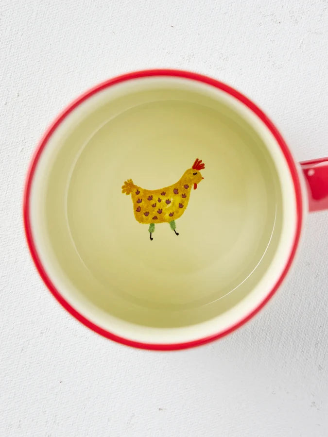 Top view inside Natural Life Free Range chicken mug showing yellow hen illustration — Adventure Awaits