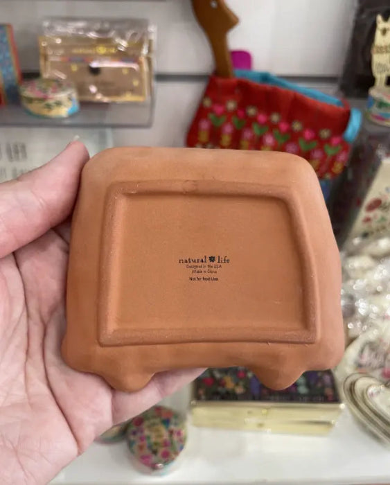 Back of Natural Life campervan trinket dish showing terracotta ceramic base and maker’s mark — Adventure Awaits