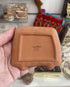 Back of Natural Life campervan trinket dish showing terracotta ceramic base and maker’s mark — Adventure Awaits