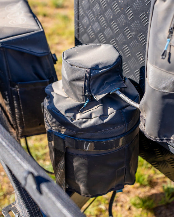 Grey Navigator Gas Bottle Buddy fitted to a caravan gas bottle with zip access for the hose - Adventure Awaits