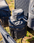 Grey Navigator Gas Bottle Buddy fitted to a caravan gas bottle with zip access for the hose - Adventure Awaits