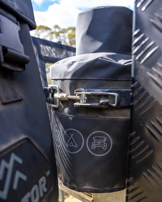 Grey Navigator Gas Bottle Buddy secured beneath the caravan gas bottle holder brace - Adventure Awaits