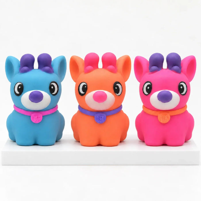 Three colourful NeeDoh reindeer squishy toys in blue, orange and pink with contrasting antlers and collars — Adventure Awaits