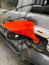 Orange fuel funnel fitted to a caravan diesel filler for easier refuelling — Adventure Awaits