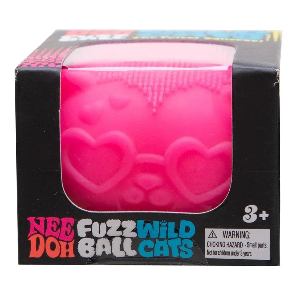 A boxed pink fuzzy ball cat toy with a heart-shaped face, shown in its retail packaging. The packaging features the brand name 'Nee Fuzz Wild Ball Cats' and a choking hazard warning label.