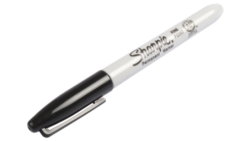 Sharpie permanent marker with black cap on a white background