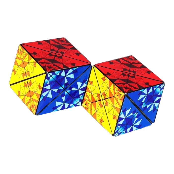 connected Shashibo magnetic puzzle cubes in colourful red, blue and yellow geometric patterns forming a flexible shape shifting sensory puzzle Adventure Awaits