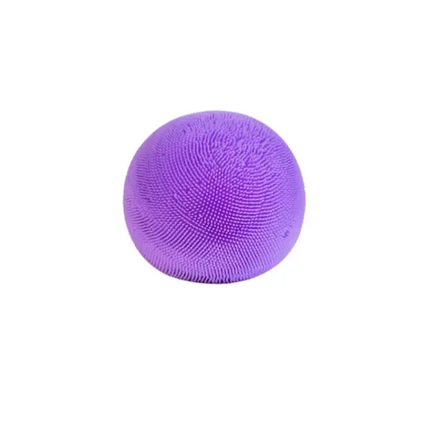 Purple textured sensory stress ball with soft tactile spiky surface for calming fidget play