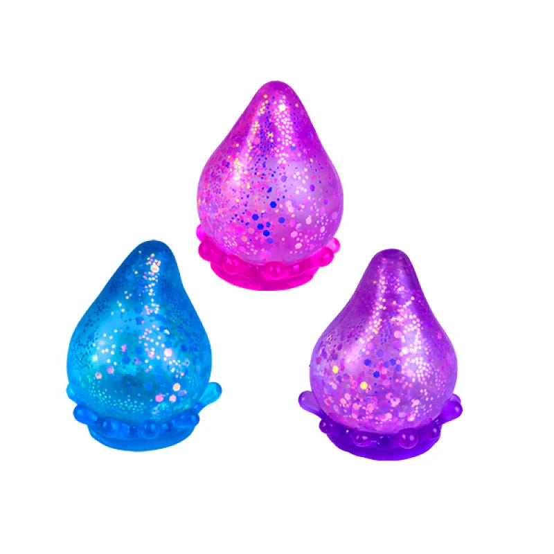 Blue, pink and purple glitter drop squishy toys with translucent sparkle finish — Adventure Awaits