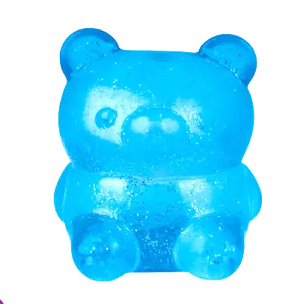 Blue bear squishy toy with translucent glittery finish on white background — Adventure Awaits