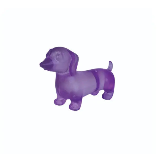 Purple translucent dachshund squishy toy on white background — Adventure Awaits