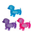 Blue, purple and pink translucent dachshund squishy toys on white background — Adventure Awaits