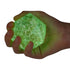 Hand squeezing green glow in the dark diamond squishy toy with glitter finish — Adventure Awaits