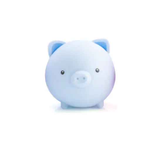 Pastel blue pig shaped squishy sensory toy with cute face and soft rounded design