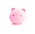 Pastel pink pig shaped squishy sensory toy with cute face and soft rounded design
