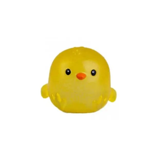 Yellow mini chick squishy toy with orange beak and black eyes on white background — Adventure Awaits