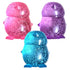 Smooshos glitter glow in the dark penguin sensory toys in pink, purple and blue with sparkling liquid-filled bodies — Adventure Awaits